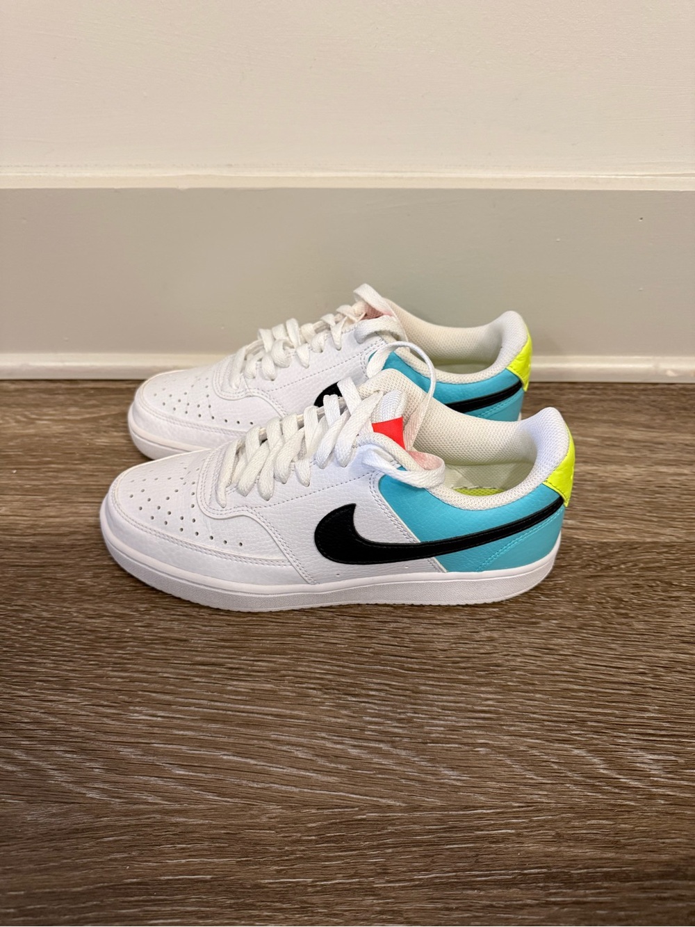 Nike White Sneakers with Black Swoosh and Aqua & Neon Yellow Accents